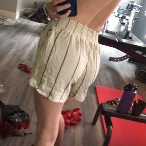 White and olive green striped flowy shorts